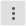 Three vertically aligned dots