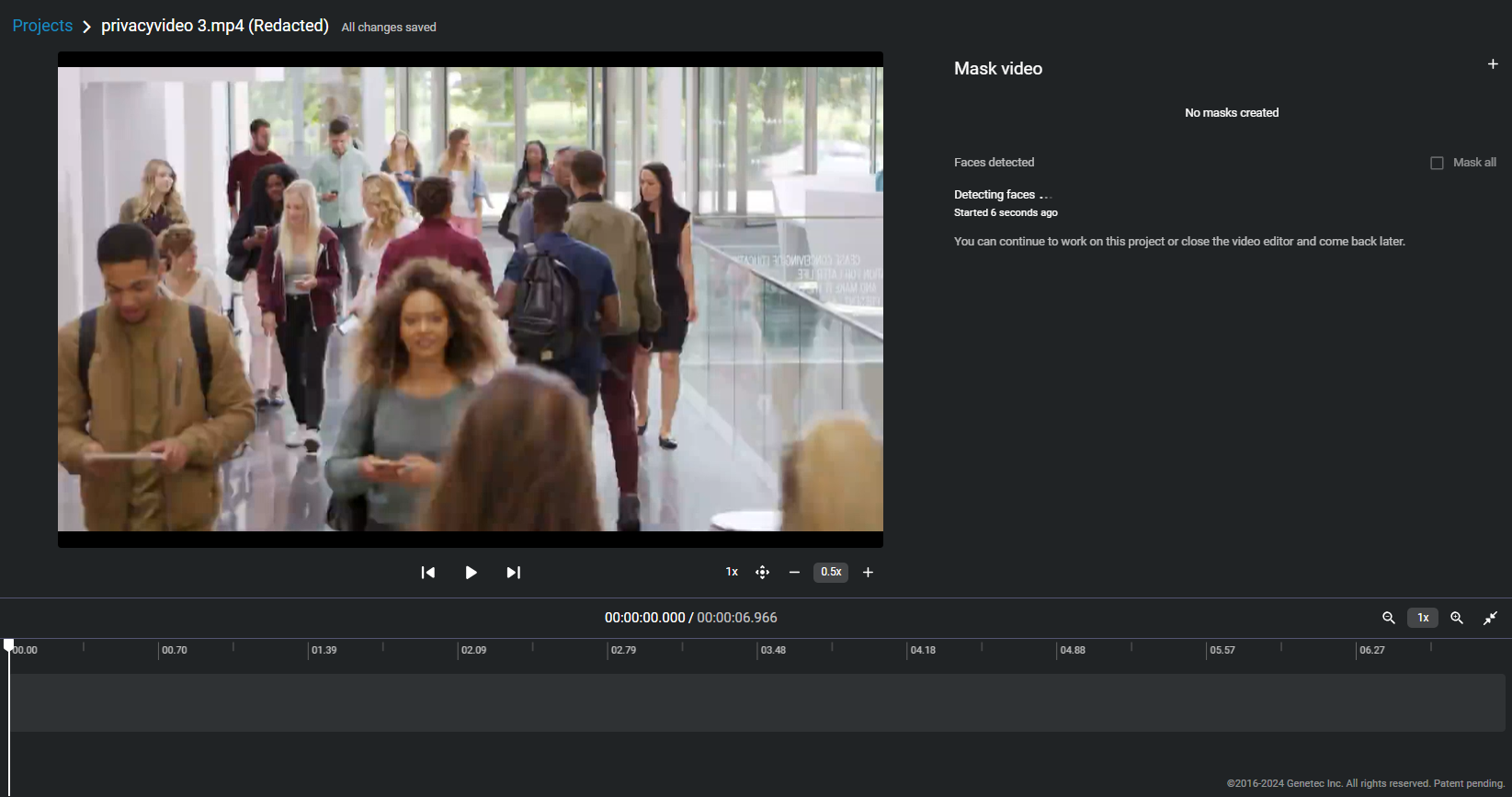 The Video editor redaction page showing a video with face detection in progress.